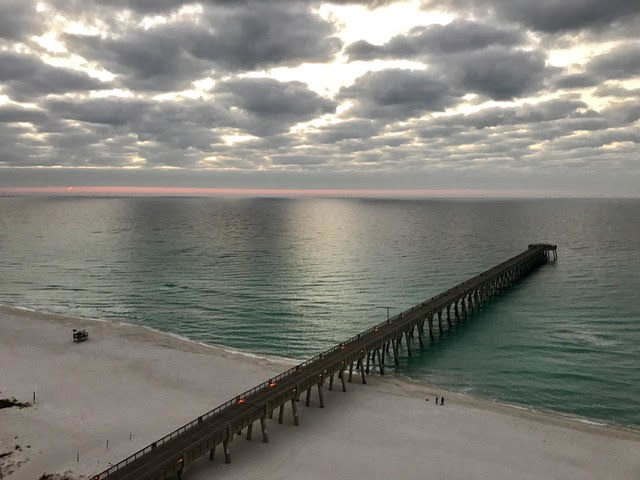 12/23